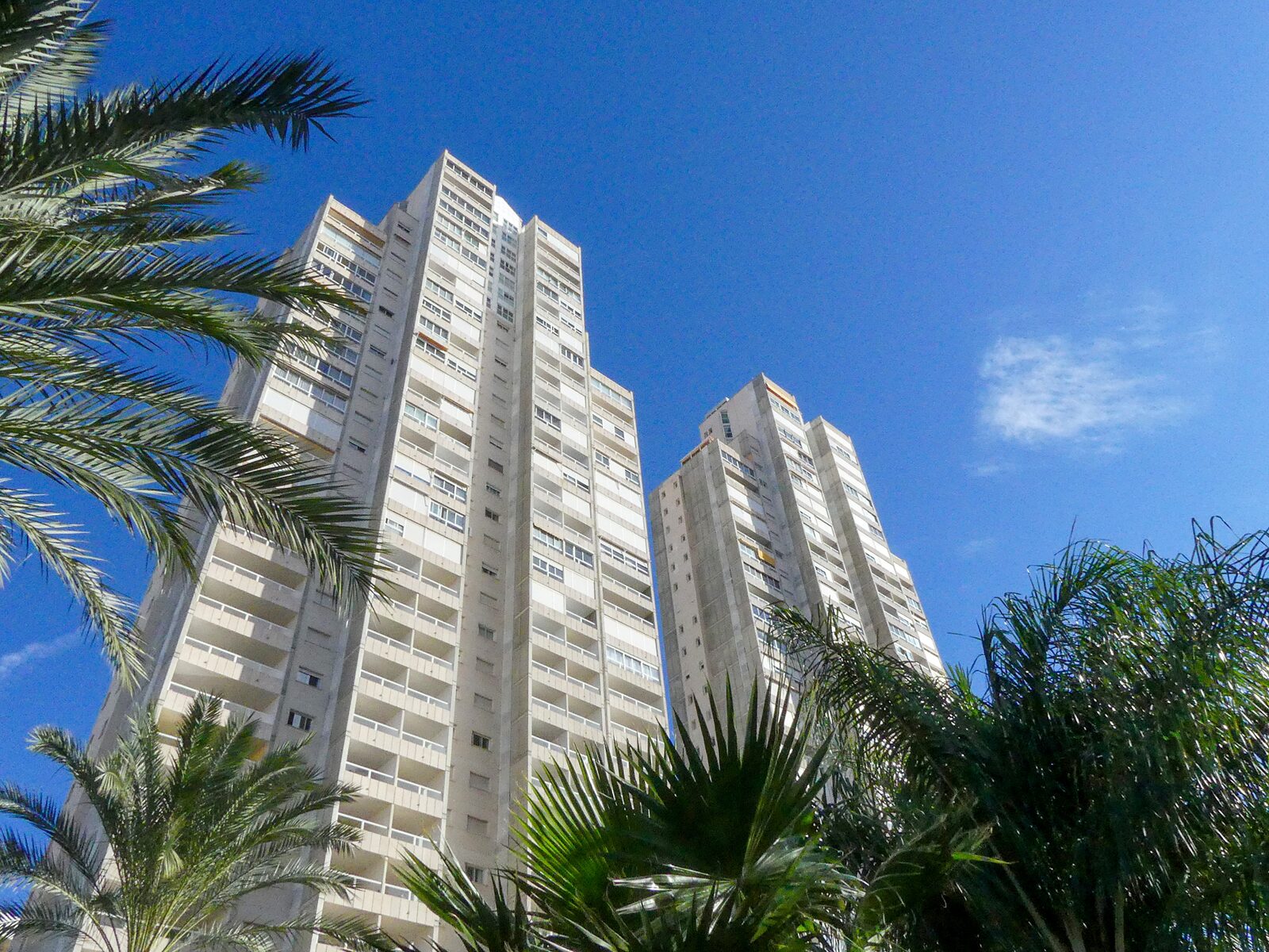 View of the towers of Gemelos 22 against the blue sky