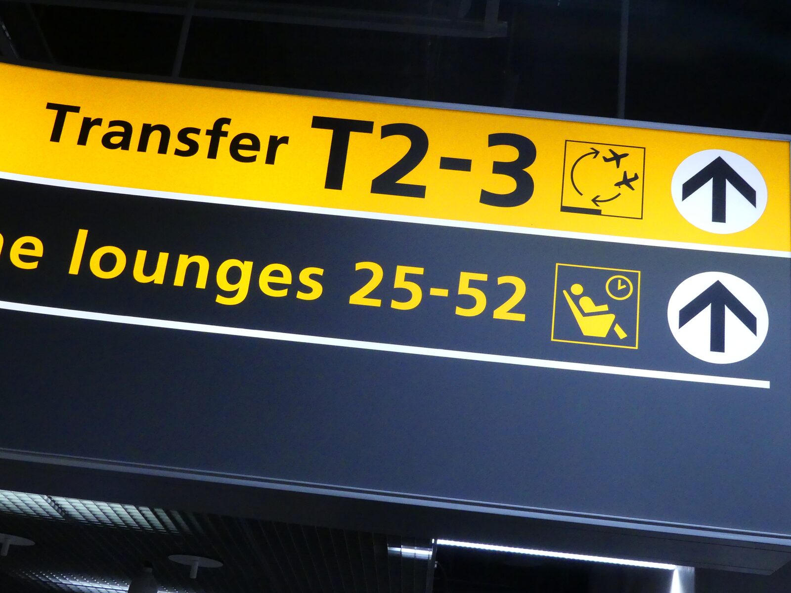Sign at airport showing transfer and lounges