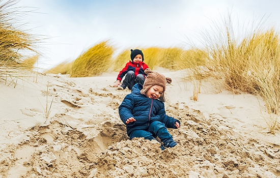 Kids in het zand