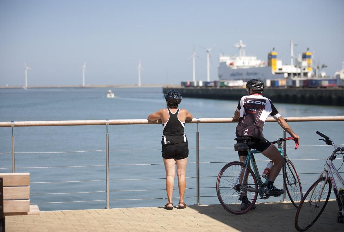 Cycling along the harbor of Zeebrugge
