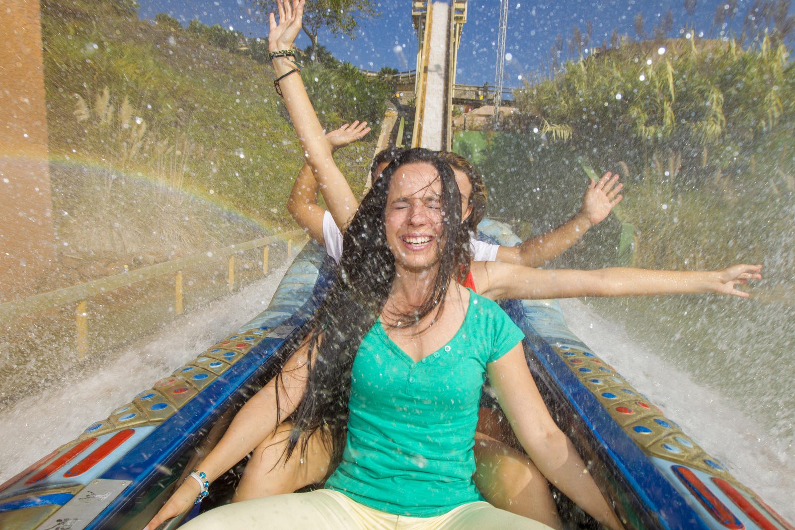 Woman on whitewater roller coaster of Terra Mitica in Benidorm