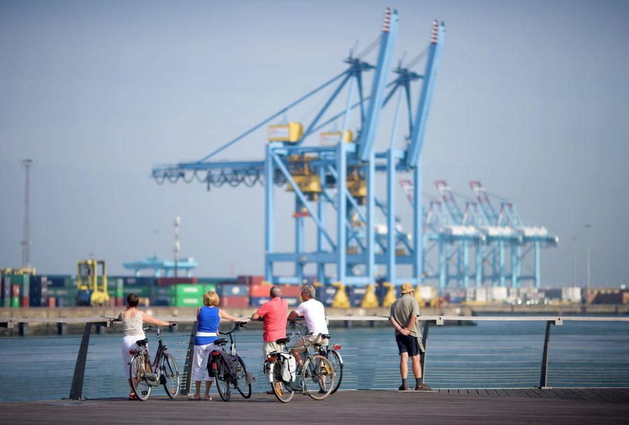 Cycling along the harbor of Zeebrugge