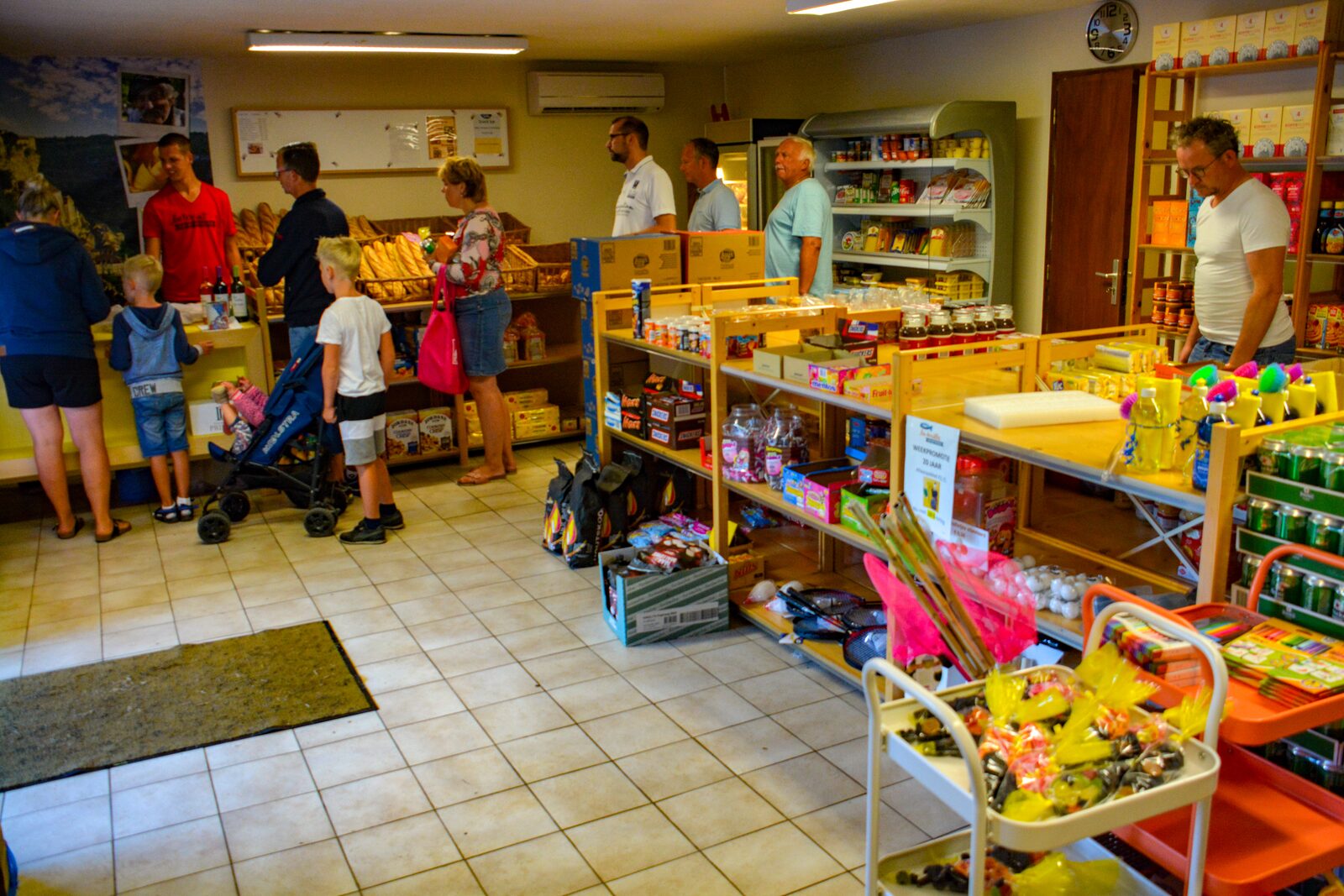 Park shop with customers at the checkout