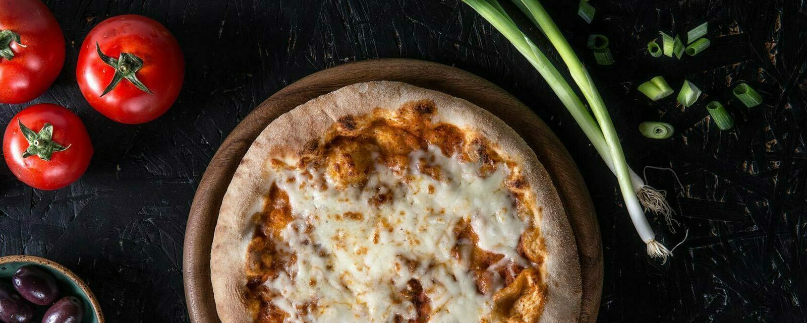 Donna Italia : une authentique pizza cuite sur pierre en seulement trois minutes.